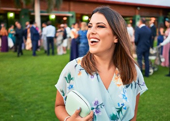 Closeup of wedding guest smiling