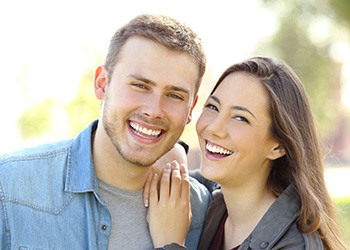 Man and woman laughing