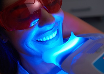 Someone getting professional teeth whitening